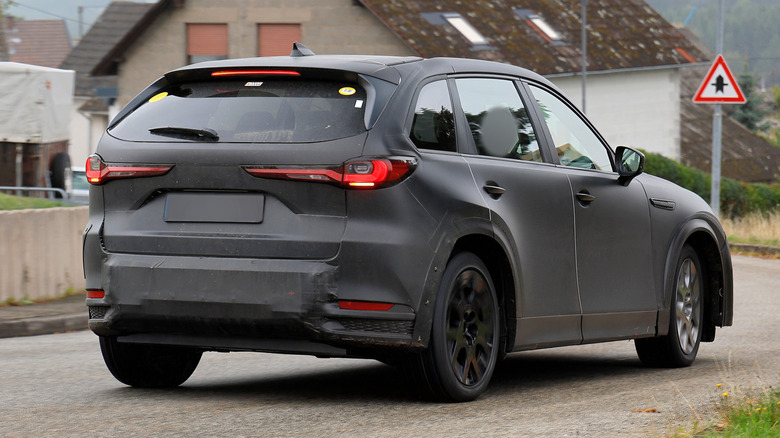 Rear 3/4 view of an electric Mazda SUV test mule