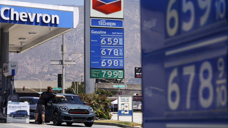 High gas prices are displayed at a Chevron gas station on May 11, 2026 in Pasadena, California.