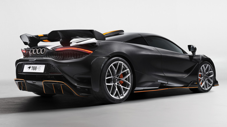 Rear 3/4 view of a black McLaren 788HS