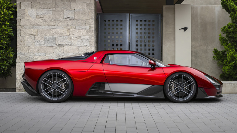 Side view of a red McLaren McL 6GT