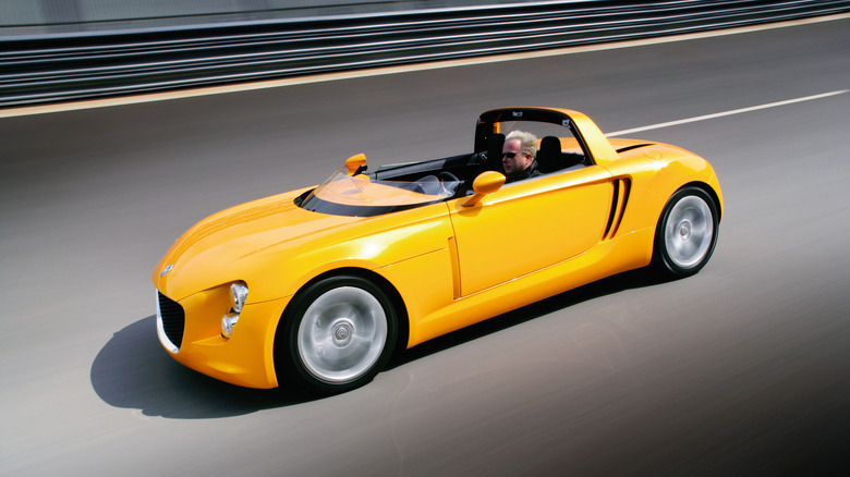 The 2005 Volkswagen EcoRacer diesel sports car concept driving on the road