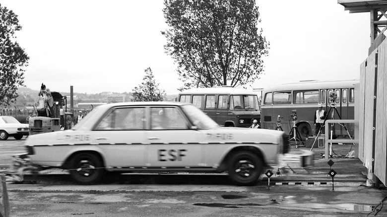 A Mercedes-Benz sedan conducting crash testing.