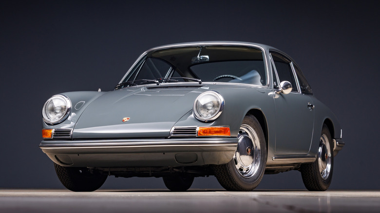 An old gray Porsche 912.