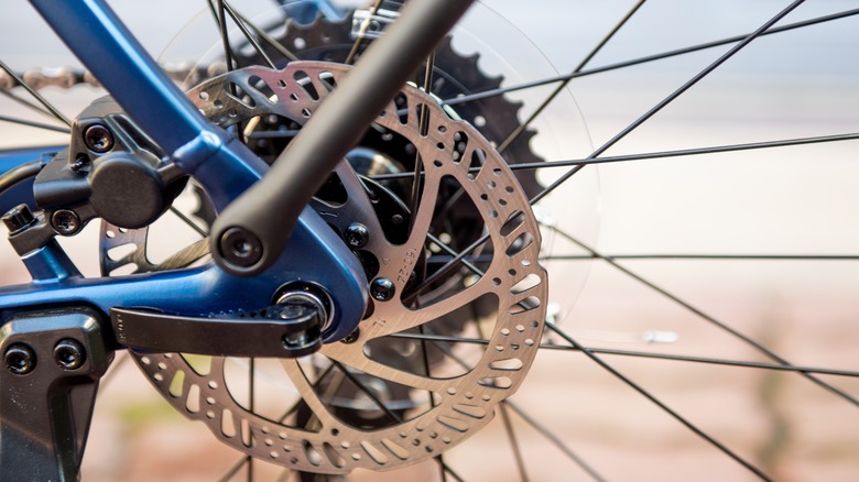 Close up of blue e-bike disc brake