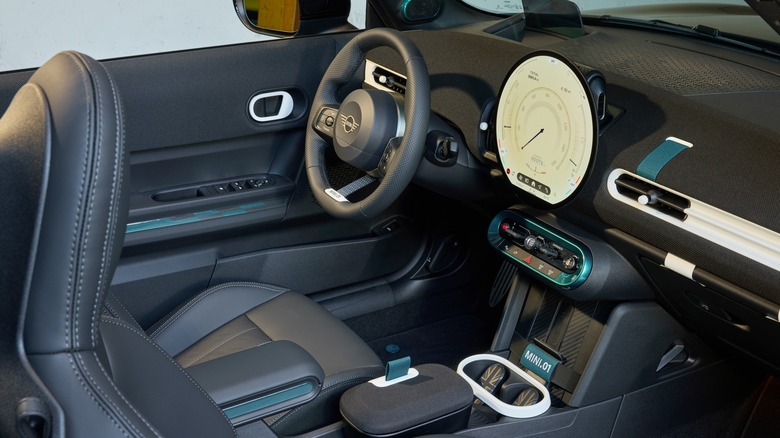 A look at the dashboard of the custom Mini showing custom white and teal accents