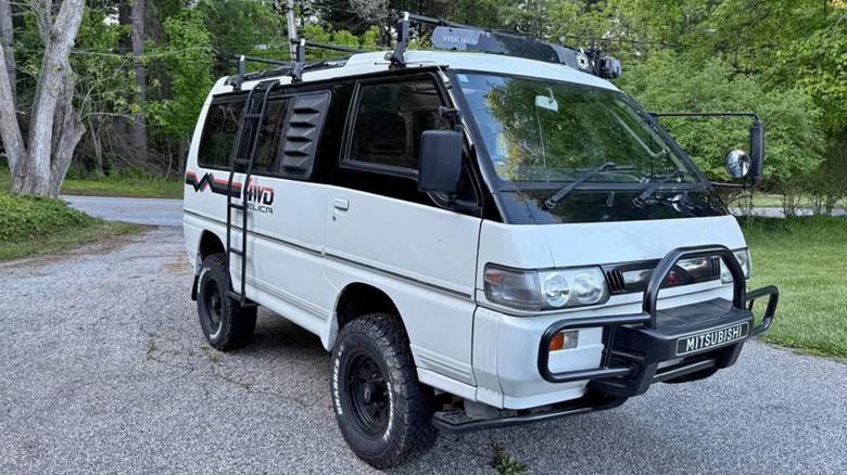 A white Mitsubishi Delica