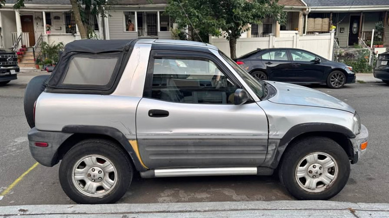 A silver Rav4 two-door