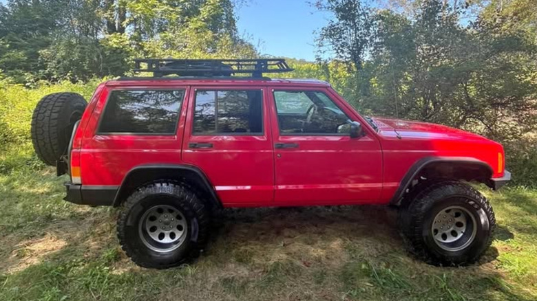 A red Jeep XJ Cherokee