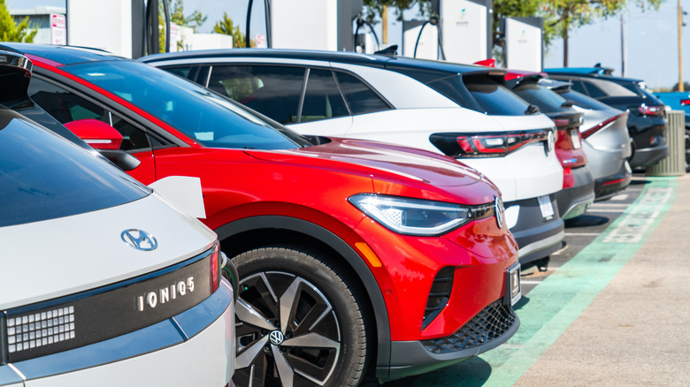 EVs lined up at a charging station