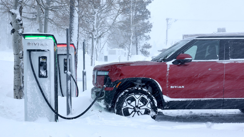 Rivian R1 charging in the snow