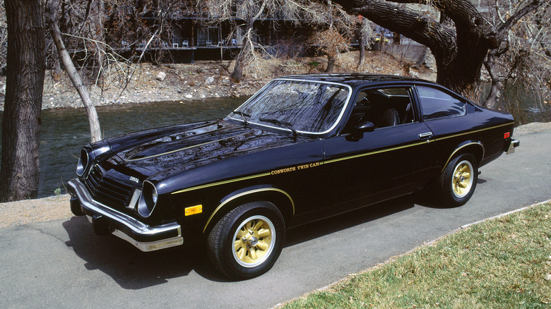A black 1975 Chevrolet Cossworth Vega praked near ar iver