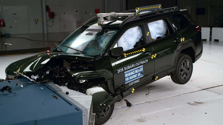 The IIHS moderate front overlap crash test of a green 2026 Subaru Outback