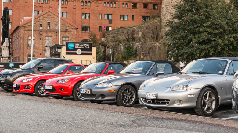 A row of Mazda Miatas