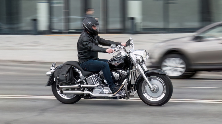 A rider riding the Harley-Davidson Fat Boy on the street