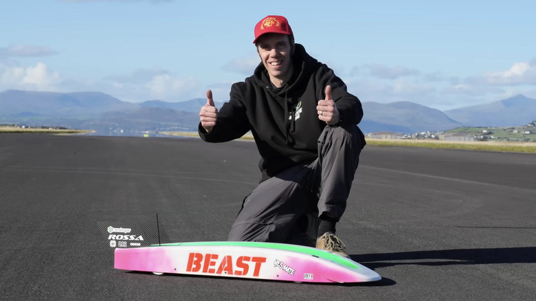 Stephen Wallis gives two thumbs-up with Beast, his homemade record-setting R/C car