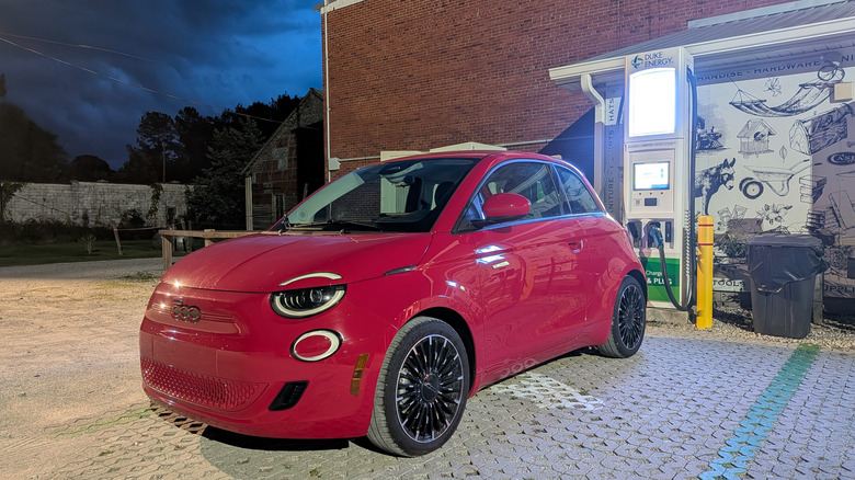 2024 Fiat 500e front 3/4 charging at night