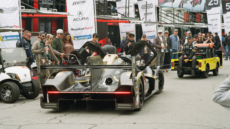 Rear end of a grey Porsche 963 at Laguna Seca