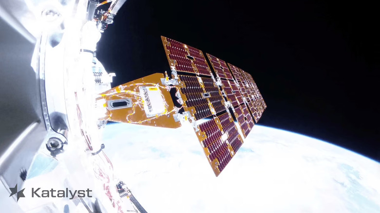 Onboard photo of the Link spacecraft in orbit above the Earth