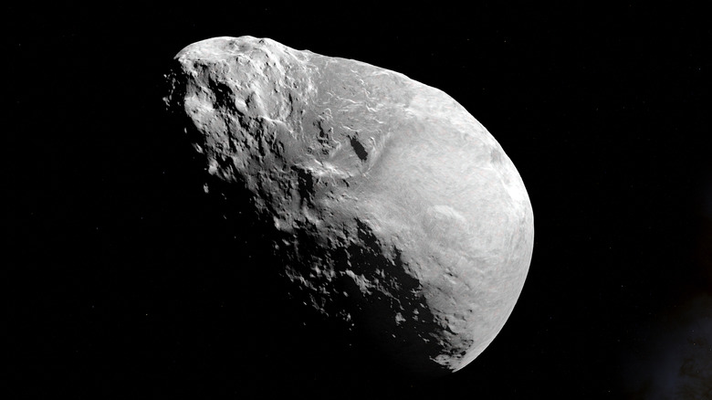 The asteroid Bennu partly covered in shadow