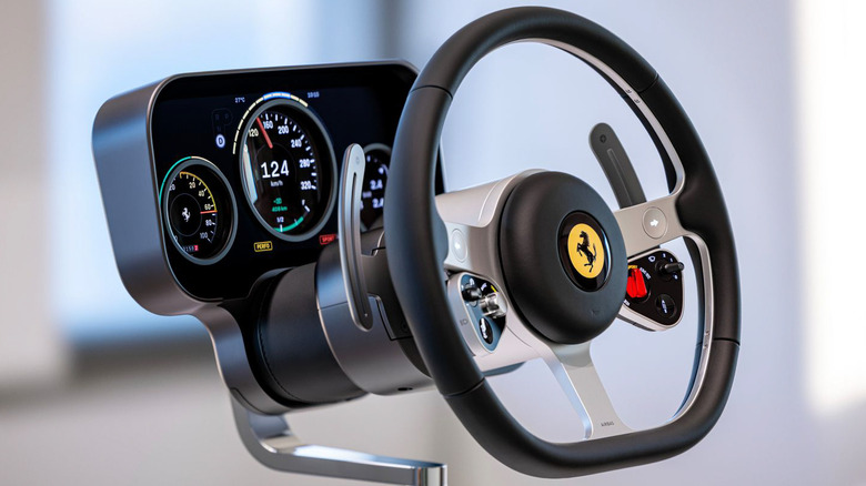 The steering wheel and gauges of the Ferrari Luce.