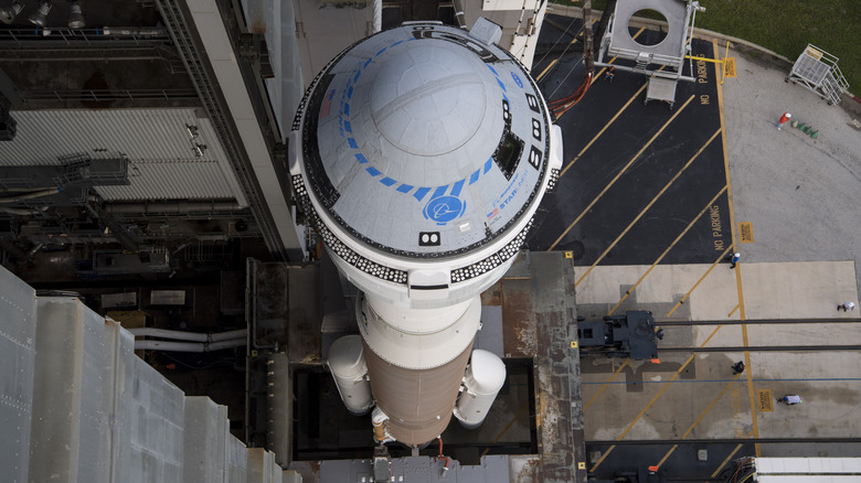 A Boeing Starliner capsule mounted atop an Atlas V rocket