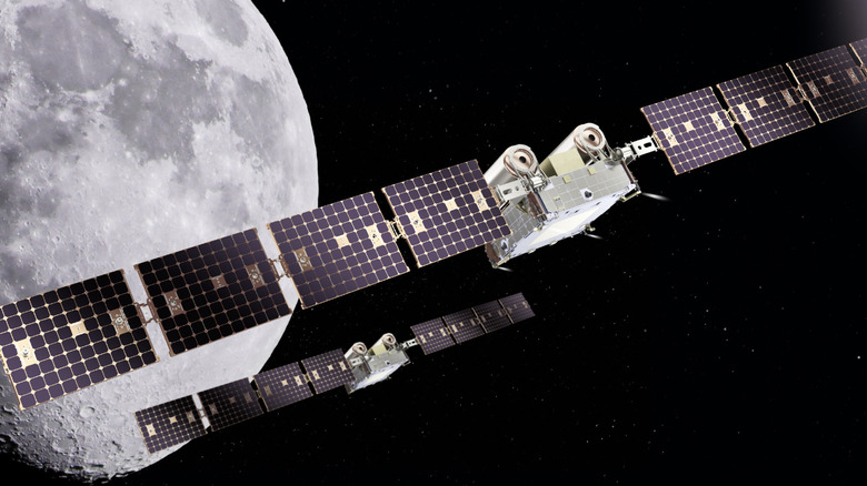 An artist's rendering of NASA's CAPSTONE 02 spacecraft in lunar orbit. The mission features two identical small spacecraft that will further mature technologies to support Artemis, Moon Base, and deep space exploration.