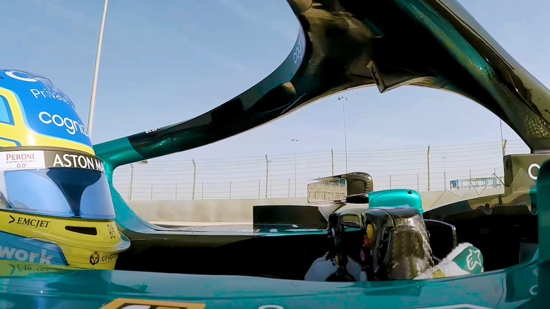 a f1 driver with a view of the upper camera mounted to the halo.