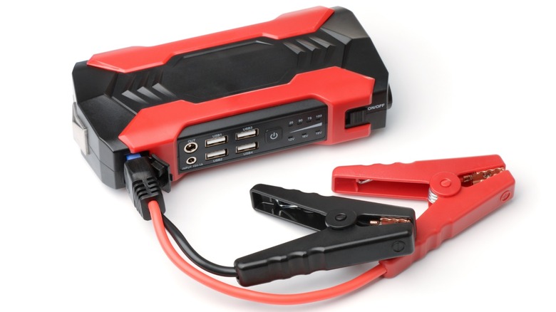 A red and black portable jump starter