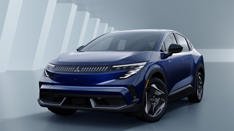 2027 Mitsubishi Eclipse Sportback front 3/4 (based on the Nissan Leaf)