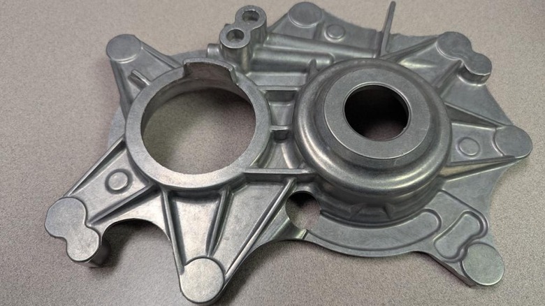 A prototype car part made of RidgeAlloy, a new recycled aluminum alloy strong enough for structural parts