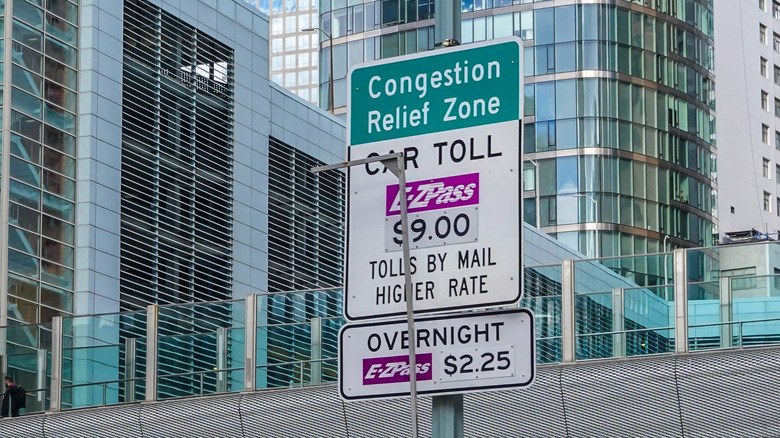 NEW YORK - JANUARY 5, 2025: Congestion prices signage in Lower Manhattan at the entrance to the Congestion Relief Zone on the first day of its implementation in New York