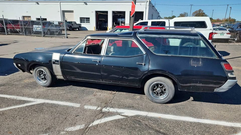 Blue-black Oldsmobile wagon
