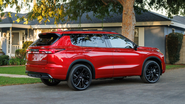 2026 Nissan Rogue PHEV rear three-quarter view