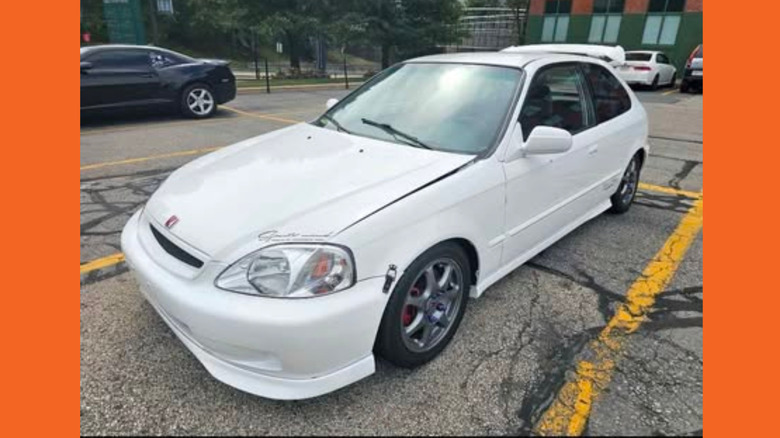 White Honda Civid hatchback