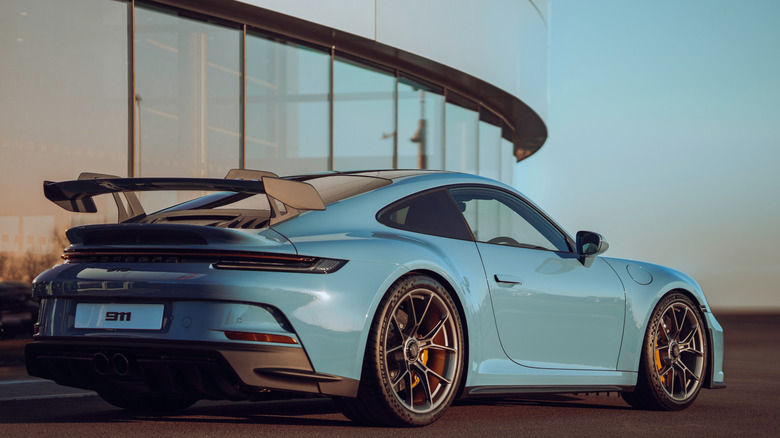 London, UK - March 28 2024: Porsche 911 GT3 RS sports car wallpaper, blue vehicle luxury German automobile