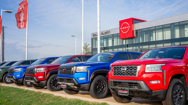 Pickup trucks seen lined up at a Nissan dealership in Texas