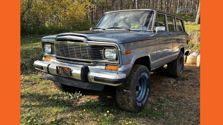 A silver Jeep Grand Wagoneer