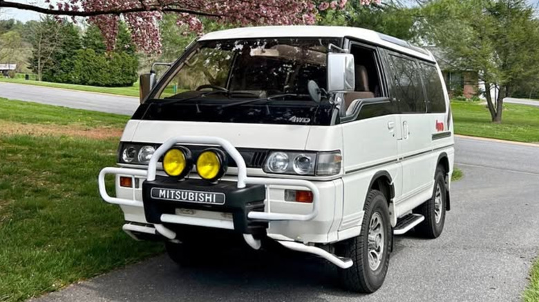 A white Mitsubishi Delica