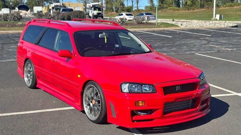 A red R34-converted Nissan Stagea
