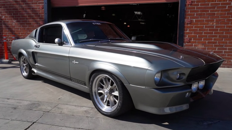 One of the three functioning Eleanor cars built for "Gone in 60 Seconds," pictured in front of a brick garage