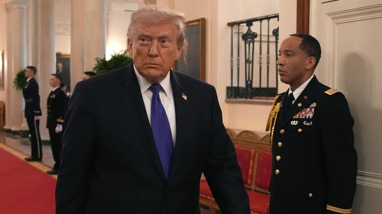 WASHINGTON, DC - MARCH 02: U.S. President Donald Trump arrives for a Medal of Honor Ceremony in the East Room of the White House on March 02, 2026 in Washington, DC. Trump awarded three soldiers the highest military decoration; Master Sgt. Roddie Edmonds, who died in 1985, for shielding Jewish prisoners from Nazi guards during World War II; then-Staff Sgt. Terry Richardson for saving 85 lives of fellow soldiers during the Vietnam War; and Staff Sgt. Michael Ollis who died in the Afghanistan War when he shielded another soldier from a suicide bomber. (Photo by Andrew Harnik/Getty Images)