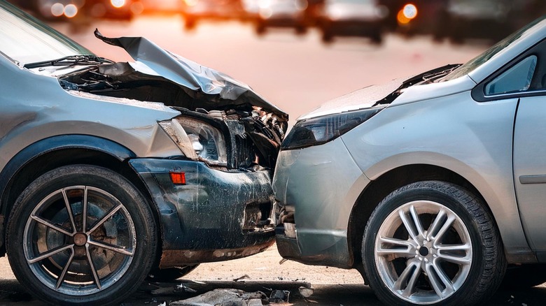 Two cars in a head-on collision