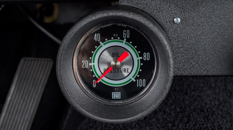 Analog oil pressure gauge.