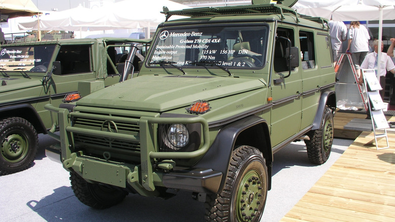 Two Mercedes-Benz G 270 military vehicles on display at a show in France in 2006