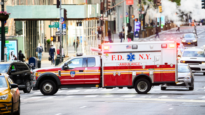 An FDNY ambulance drives on Fifth Avenue during the coronavirus pandemic on May 20, 2020 in New York City.