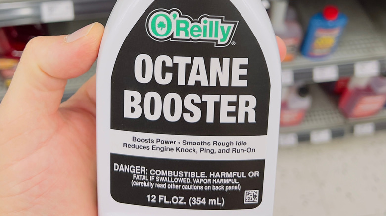 Person holding O'Reilly octane booster