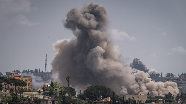 Smoke rising in the city of Nabatieh, Lebanon after an airstrike
