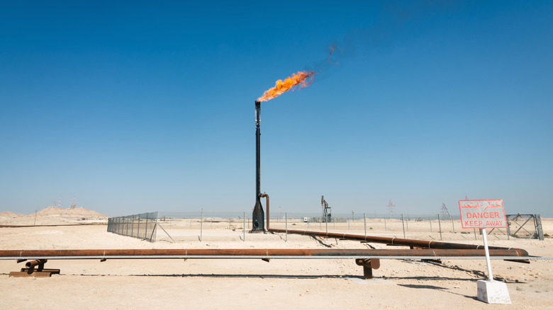 A stack flares at an oil pipeline in Bahrain.