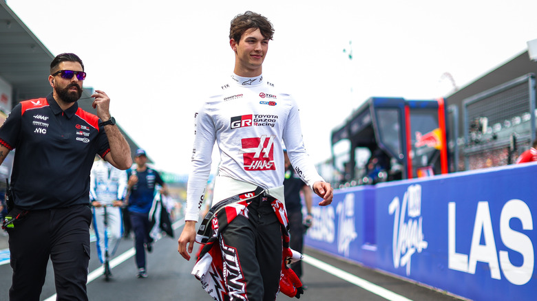 Oliver Bearman of Great Britain and Haas F1 Team walks in pit lane during the F1 Grand Prix of Japan at Suzuka Circuit on March 29, 2026 in Suzuka, Japan.