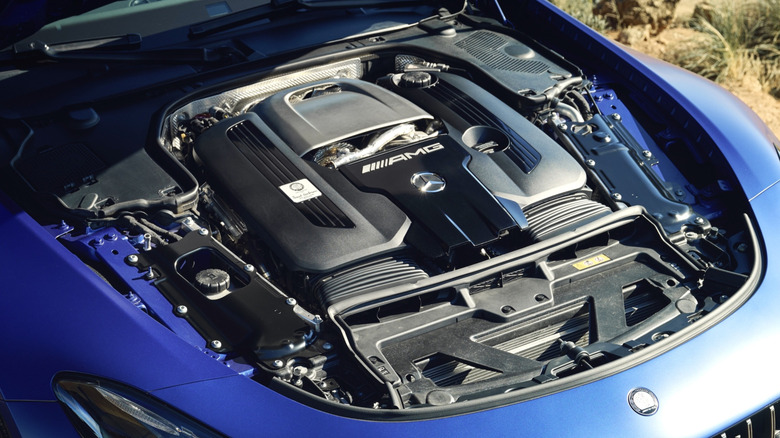 A Mercedes-AMG M177 V8 living under the hood of a blue AMG GT Coupe.
